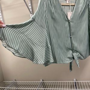 New with tags cute satin light weight top size L -